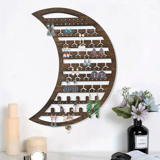 Luna Wall-Mounted Jewelry Organizer, moon-shaped wooden rack mounted on wall holding necklaces and earrings