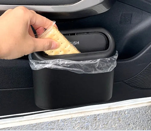 Collapsible Car Bin mounted in a car door pocket, in use