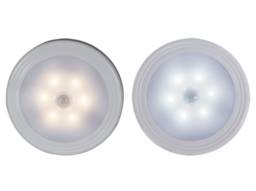 Motion-sensor closet light in use inside a wardrobe
