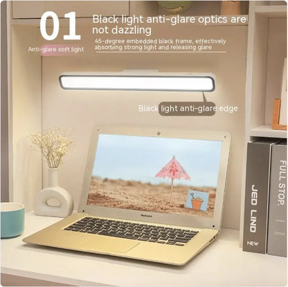 Halo Glow Rechargeable Desk Lamp in White, mounted above a laptop workspace